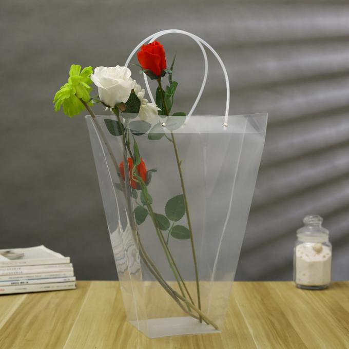 La floristería PP transparentes empaqueta el empaquetado en conserva del regalo de la fruta de la parte inferior que cuece de la bolsa de asas de gran tamaño ancha cuadrada de la torta