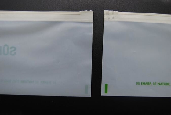 Bolso abonable biodegradable de la cerradura del resbalador del almidón de maíz del PLA del resbalador del 100% del bolso material abonable del apretón para el almacenamiento de la comida