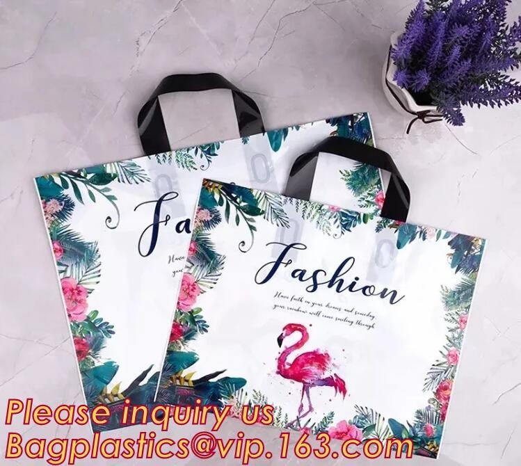 Bolsos suaves plásticos biodegradables amistosos de la manija del lazo de Eco, bolsos de compras suaves al por menor de la manija del lazo, packa reciclable de la ropa